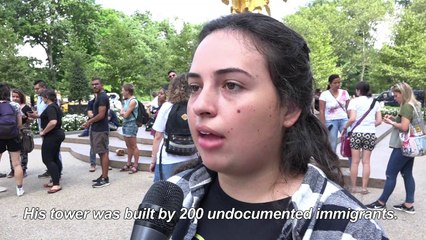 Immigration protesters chain themselves to Trump Tower doors