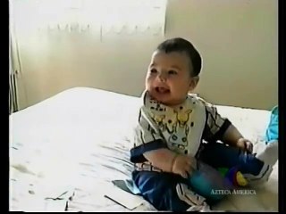 Cute baby laughing hysterically
