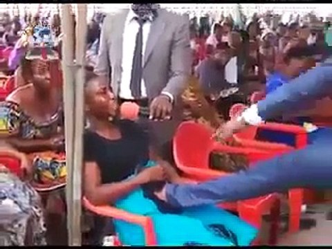 this priest in africa was praying for this young lady