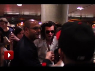 Harry Styles MOBBED By Girls Outside LA International Airport