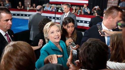 Clinton tells story of her dad's drapery printing business