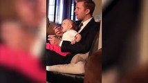 Dad Gets Distracted While Feeding Baby