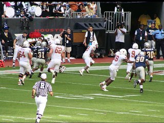 Cheerleader battling leukemia brought to tears by football team's moving gesture