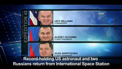 Record-holding US astronaut and two Russians return to Earth