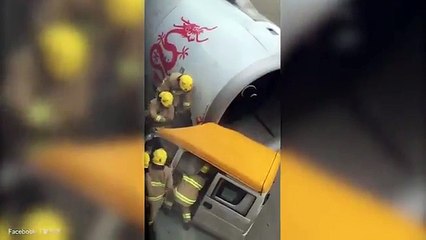 Passenger films emergency services at plane crash in Hong Kong