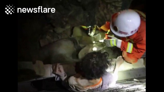 Firefighters rescue elderly man who got stuck in a wall