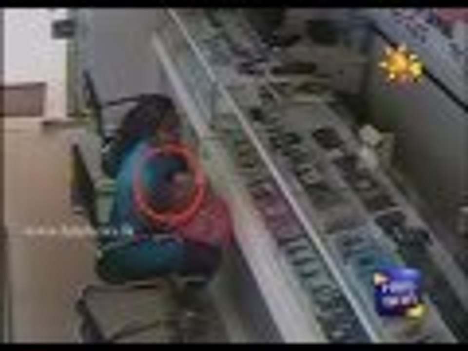 A mobile robbery caught on CCTV.