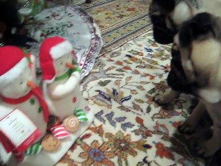 Christmas Pugs and Singing Hallmark Snowmen
