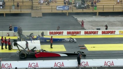 Des dragsters au démarrage font trembler un bouteille à 50m