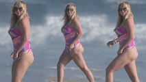 Kesha Shows Off in Bright Bathing Suit on L.A. Beach
