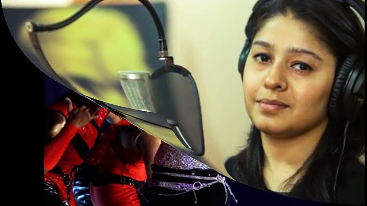 Sunidhi Chauhan on stage with microphone