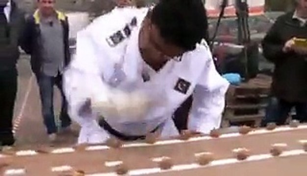 Muhammad Rashid of Pakistan sets World Record of Cracking Walnuts