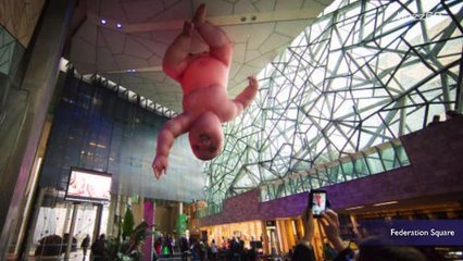 Giant Inflatable Baby on Ceiling is Modern Take on the Sistine Chapel