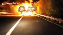 Car transporter bursts into flames, destroying 18 cars