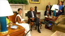Obama vows to lift Myanmar sanctions as Suu Kyi visits