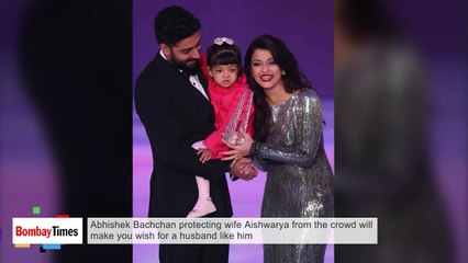 Abhishek Bachchan Protects Wife Aishwarya from the Crowd