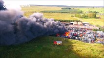 Dramatic aerial footage of a massive fire at a car lot in Northern Ireland