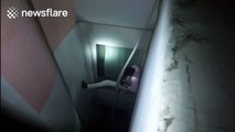 Man gets trapped between walls, ten floors up
