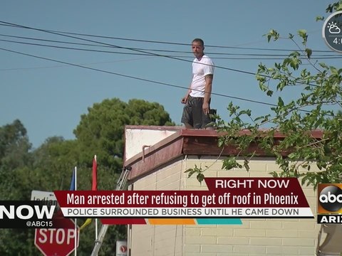 Man arrested for refusing to get off PHX roof