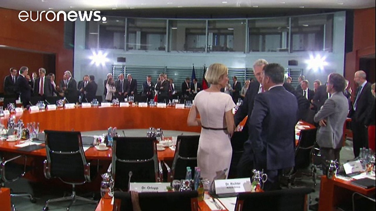 Merkel tell German companies to speed up hiring of refugees