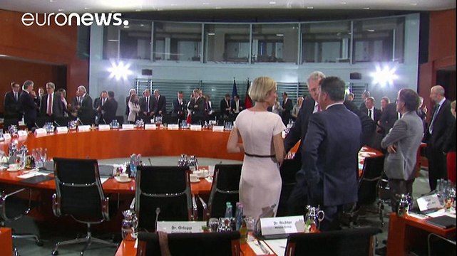 Merkel tell German companies to speed up hiring of refugees