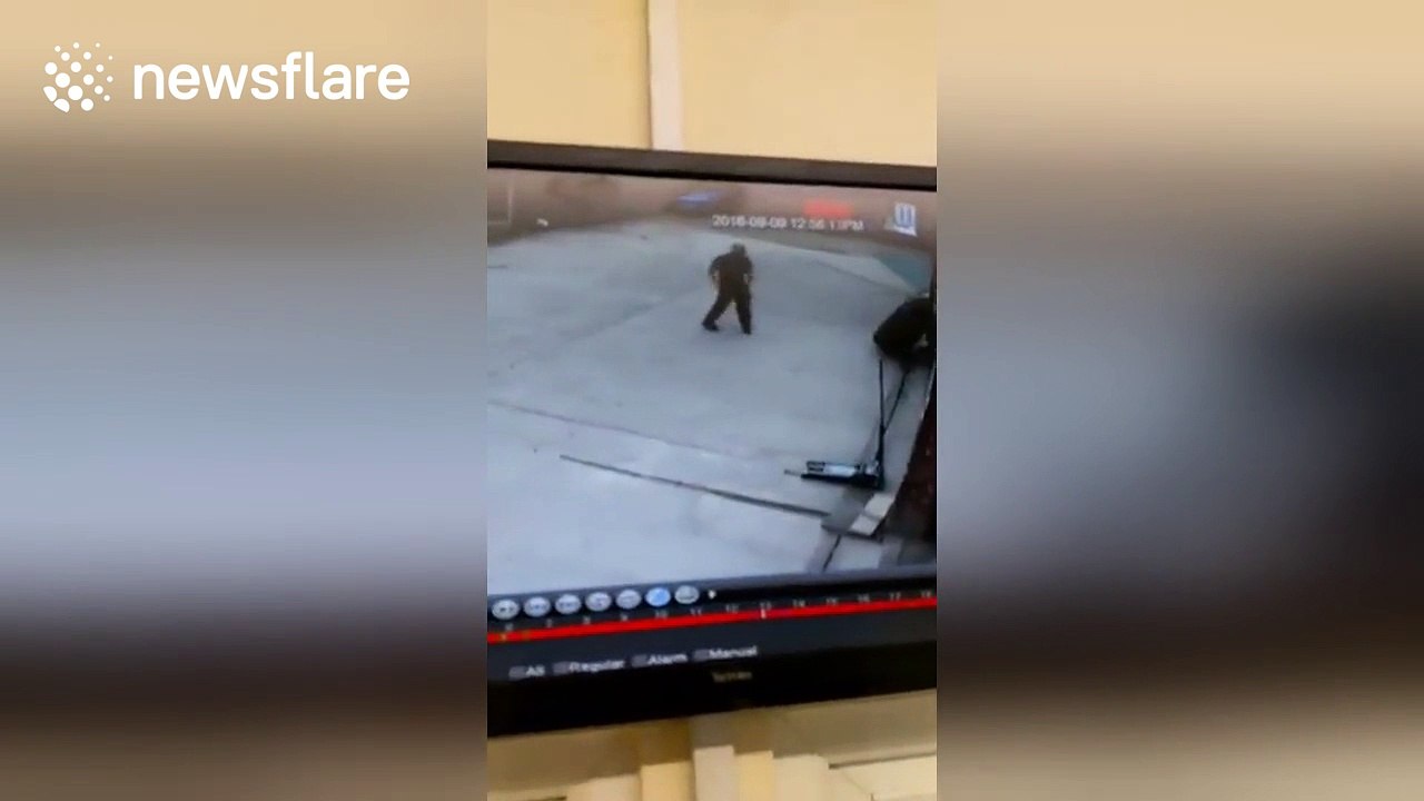 Man tries to lift tyre above his head, fails spectacularly