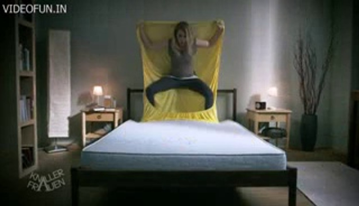 Me trying to make the bed in our trailer
