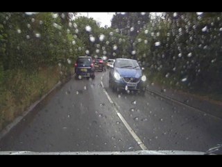 Driver Splashes Pedestrian