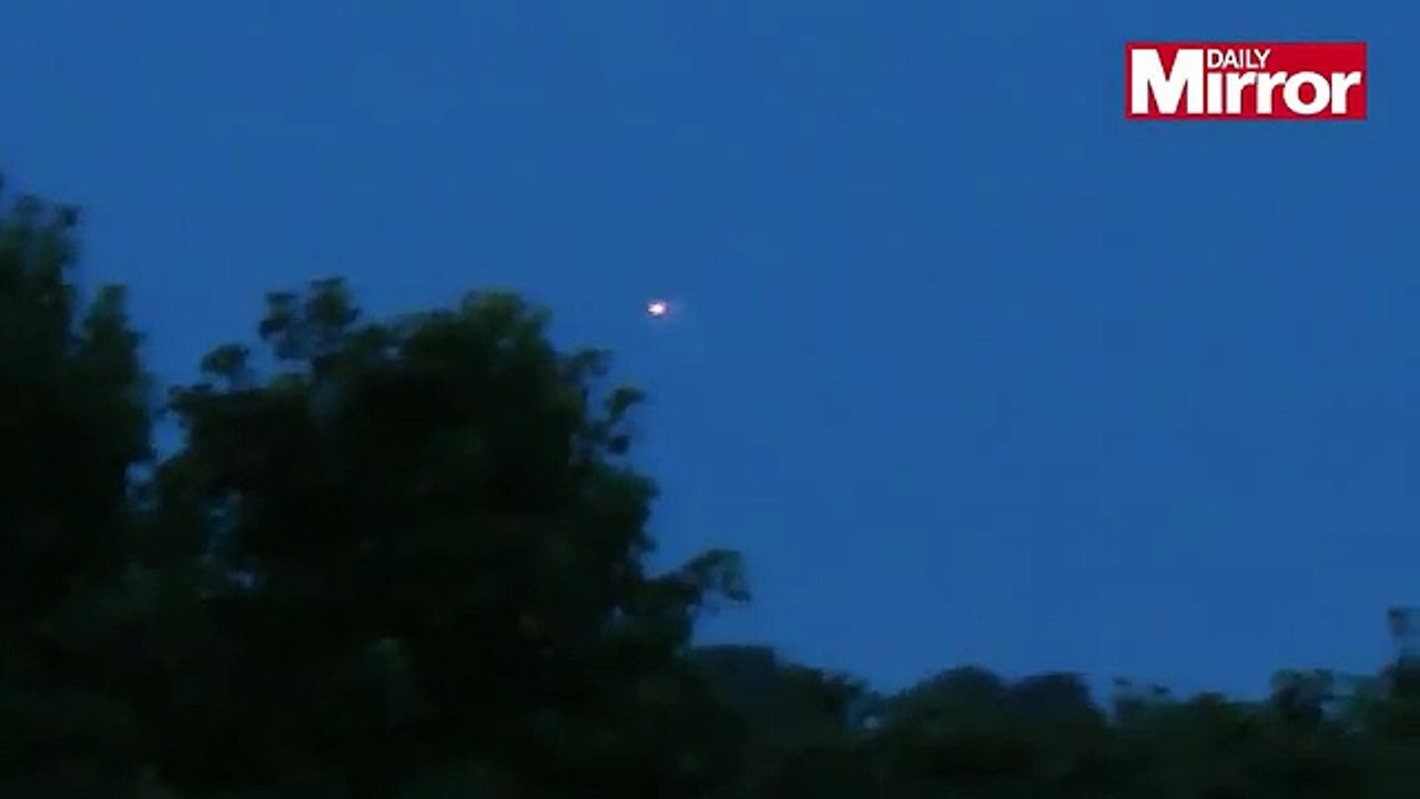 Bizarre UFOs caught shining over forest by dog walker moments before fully charged camera mysterios