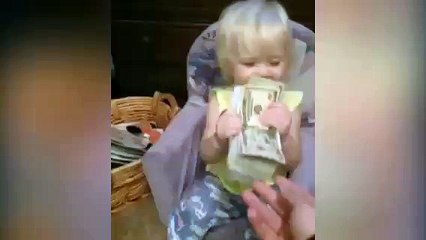 Funny Kid Has Crazy Laugh With Money