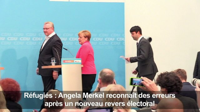Réfugiés: Merkel reconnaît des erreurs après un revers électoral