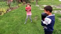 Little girl knocks out boy!!!