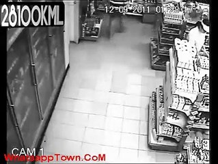 Man possessed by ghost on CCTV (MUST SEE)-