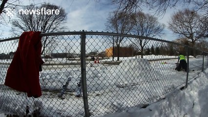 Man skis straight into fence