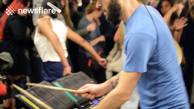 Amazing drummer starts dance party in New York subway station