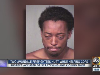 Phoenix firefighters help police officers make arrest