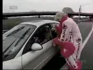 Edge mimicks Ric Flair's road rage incident.