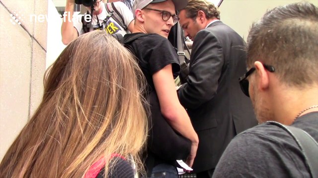 Sofia Vergara and her husband Joe Manganiello get mobbed by paparazzi at LAX Airport