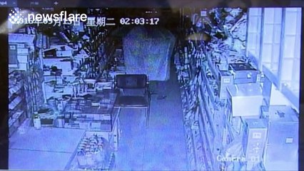 Cloaked thief, armed with umbrella steals cigarettes from newsagents