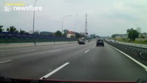 Lorry tyre bursts on motorway in Malaysia
