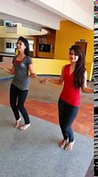 Two Indian Girls dancing to a Bollywood song