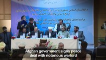 Afghan government signs peace deal with notorious warlord