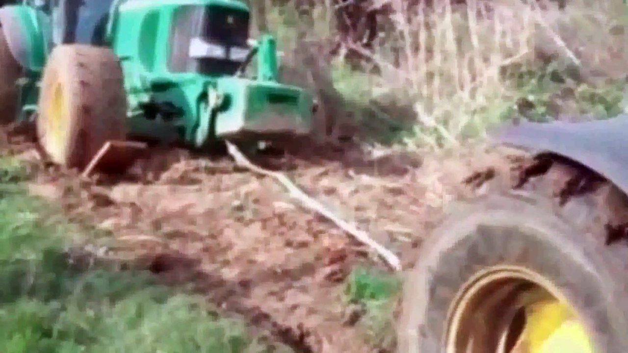 Tractor stuck in the mud. Heavy equipment fail compilation