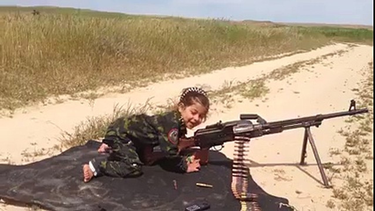 Child playing with gun
