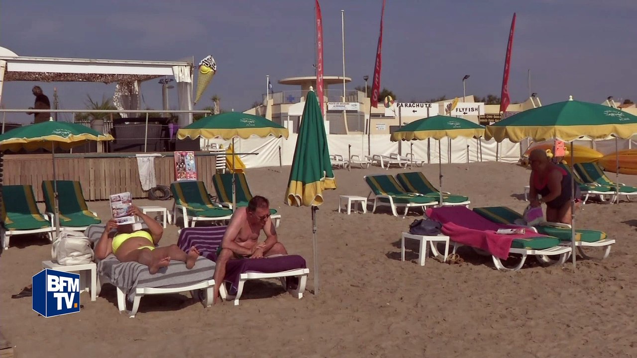 Des vacanciers de septembre profitent du soleil