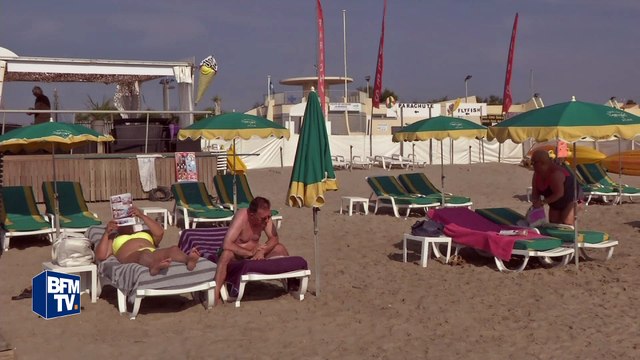 Des vacanciers de septembre profitent du soleil