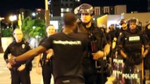 Peace activist tries to calm Charlotte protests with free hugs