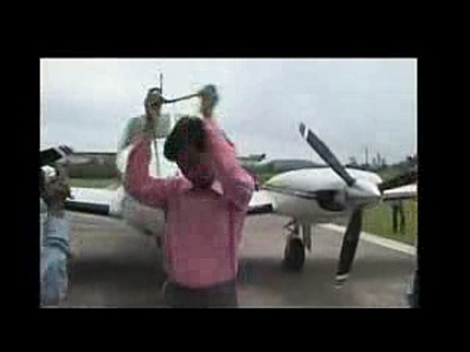 Indian pulls a plane with his teeth