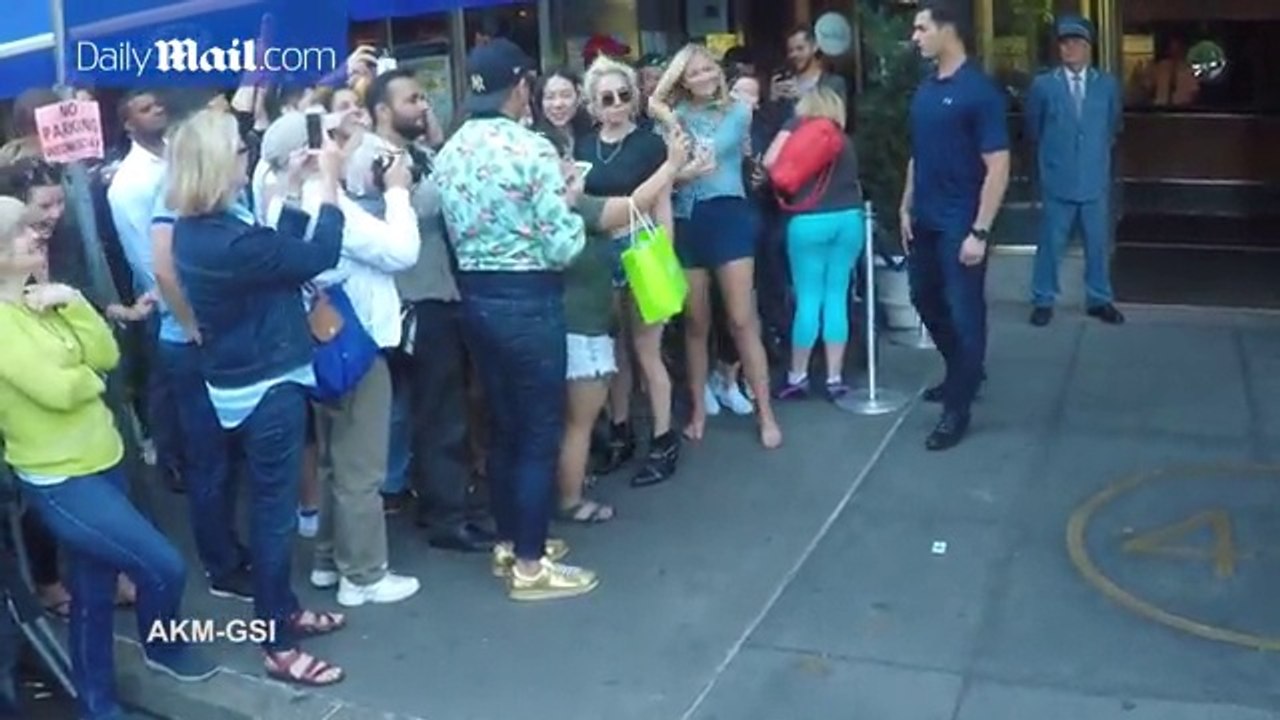 Lady Gaga steps outside in see through top for her fans