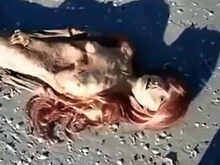 scary real mermaid found On the beach 2013
